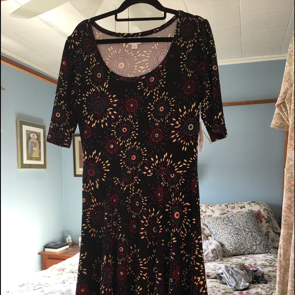 LuLaRoe "Nicole" dress unique pattern. Black